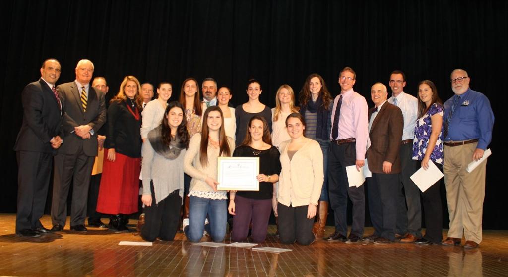 Freeholder Thomas A. Arnone, Freeholder John P. Curley and Freeholder Deputy Director present certificates of recognition to Middletown South High School’s Eagles girls basketball team for winning the 2014-15 NJSIAA Public Group III Girls Basketball Championship at the Middletown Board of Education meeting on March 24.